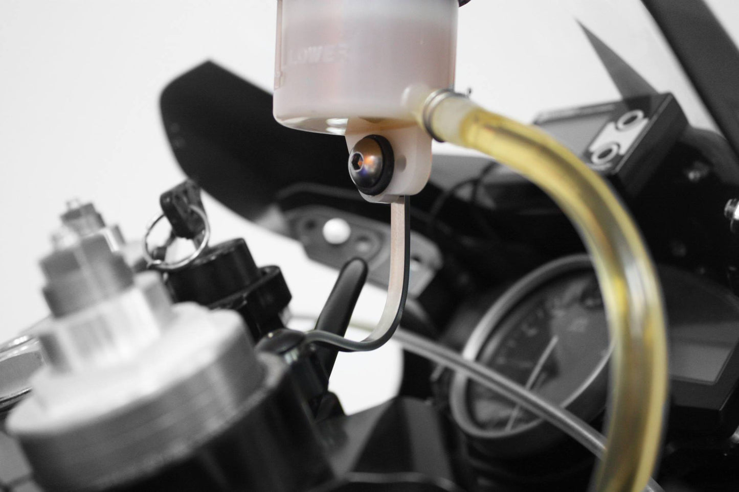 UNIVERSAL RESERVOIR BRACKET STAINLESS STEEL ( Driven Racing )